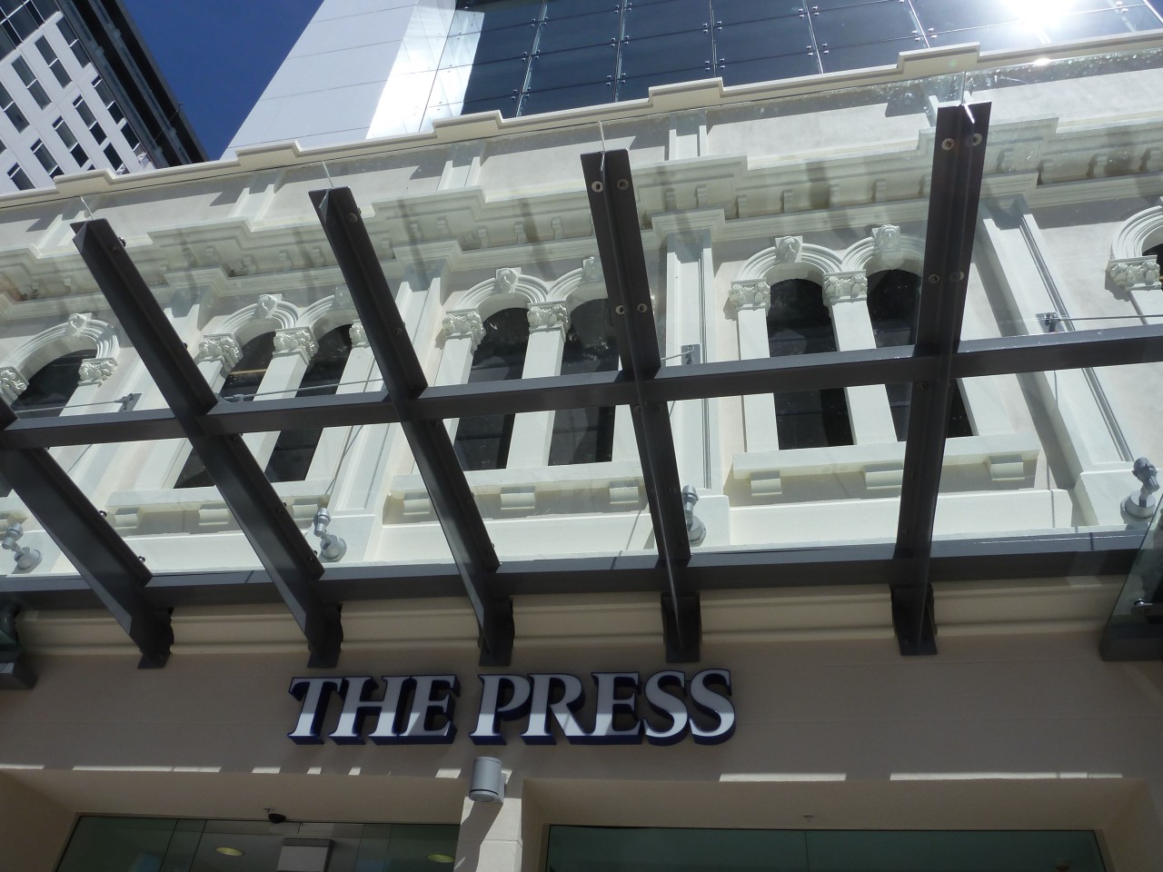 This heritage facade was restored by the team building, daylighting, structure, black, gray