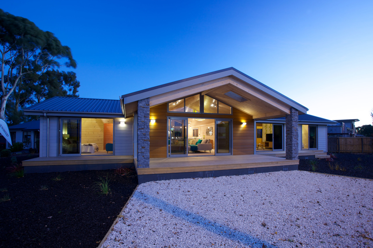 The new Lockwood show home in Christchurch features architecture, cottage, elevation, estate, facade, home, house, lighting, property, real estate, residential area, roof, siding, sky, window, blue