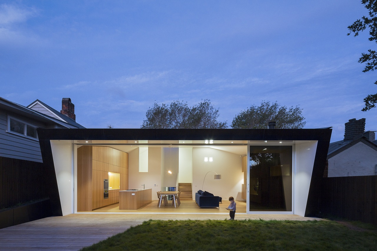 This black house features aluminium joinery from the architecture, elevation, estate, facade, home, house, property, real estate, residential area, roof, sky, window, teal