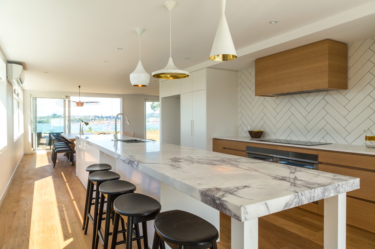 Dramatic kitchen island in Devonport renovation with patterned countertop, interior design, kitchen, property, real estate, table, gray