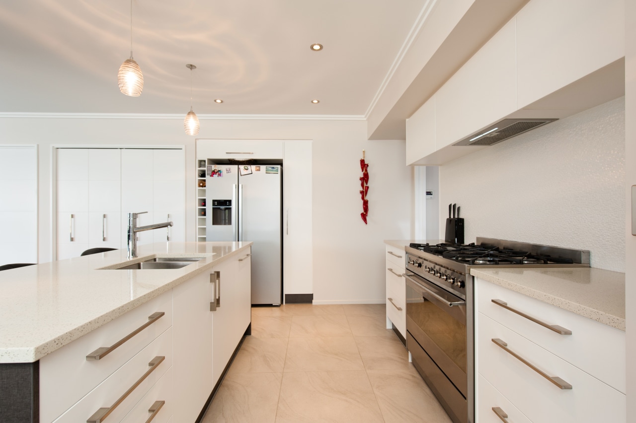 This serene kitchen splashback features crafted tilework all countertop, cuisine classique, floor, interior design, kitchen, property, real estate, room, gray