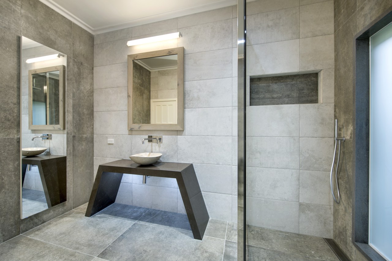 For this dressed to impress bathroom, designer Owen architecture, bathroom, floor, interior design, real estate, room, tile, gray