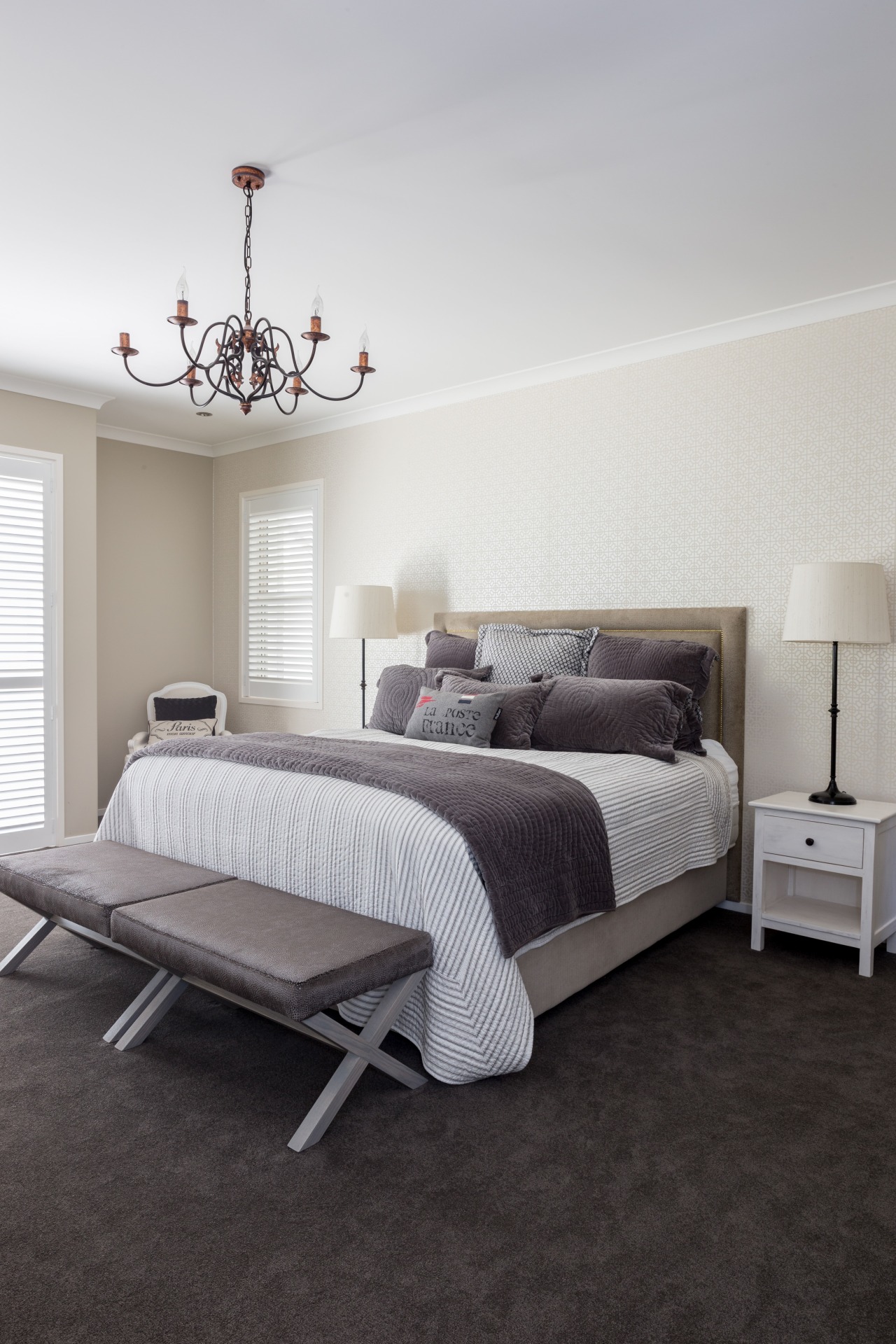 In this Yellowfox project, the master bed-room has bed, bed frame, bedroom, ceiling, floor, flooring, furniture, home, interior design, room, wall, wood, gray, black