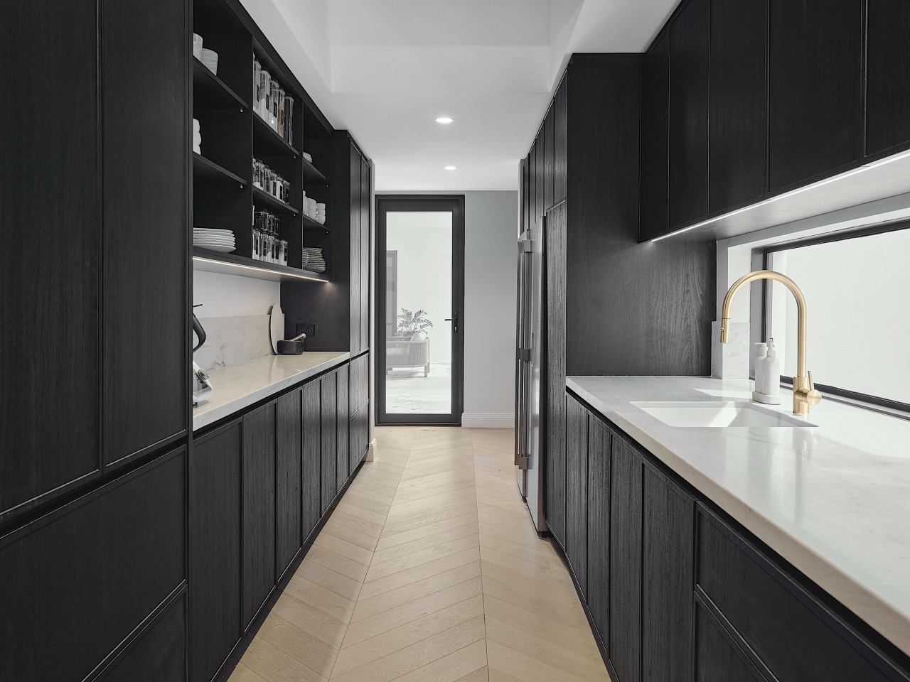 The behind-the-scenes well-appointed scullery. 