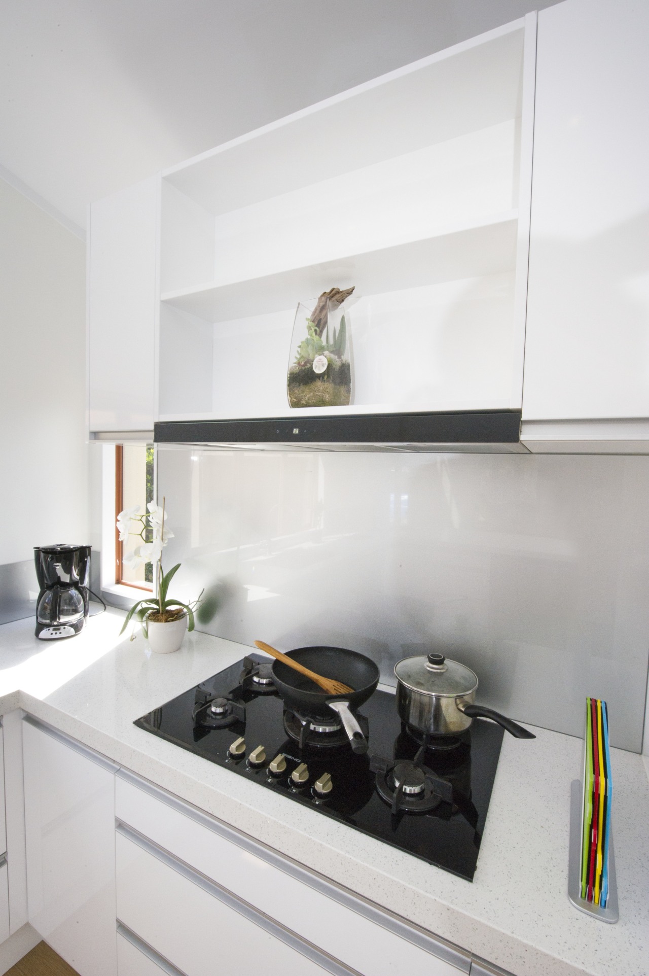 This cooktop  by Eisno  contrasts and countertop, interior design, kitchen, product design, room, shelf, shelving, white