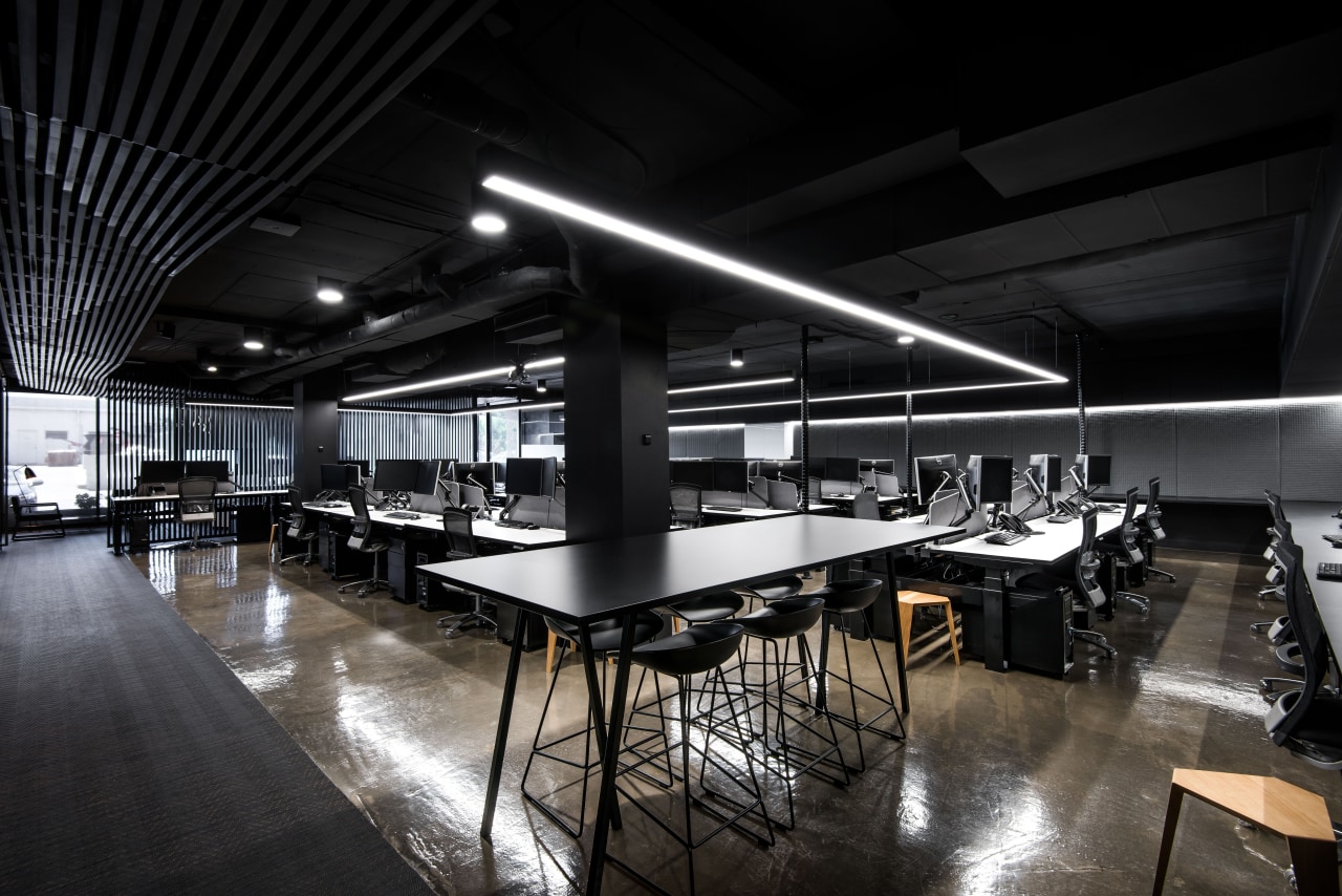 For this fit-out, original concrete floors were retained architecture, ceiling, interior design, table, black