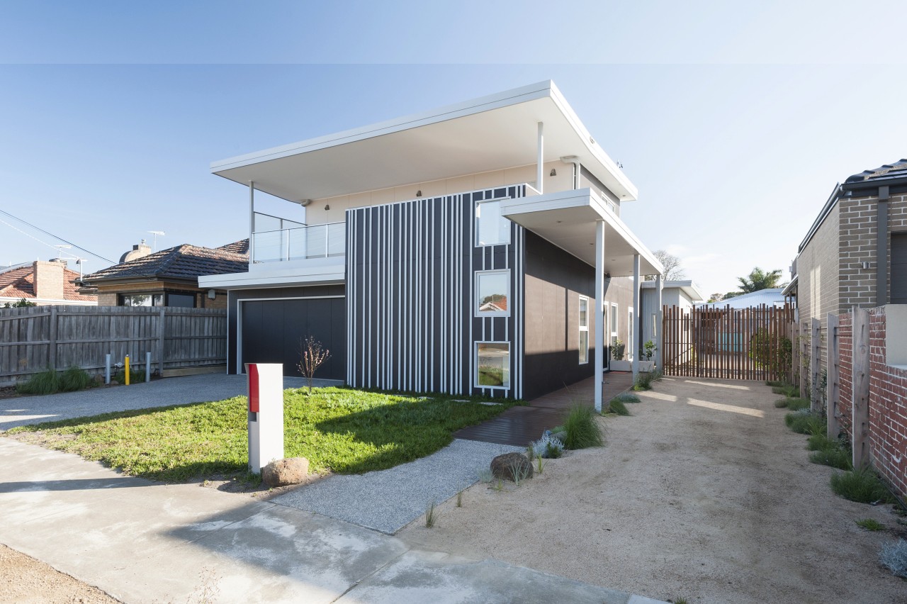 The Green &amp; Gold House designed by Positive facade, home, house, neighbourhood, property, real estate, residential area, white