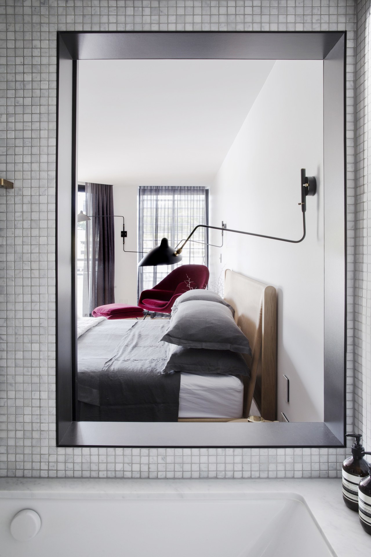 This view from within the bathing pod of bed, bed frame, door, furniture, home, interior design, room, window, gray