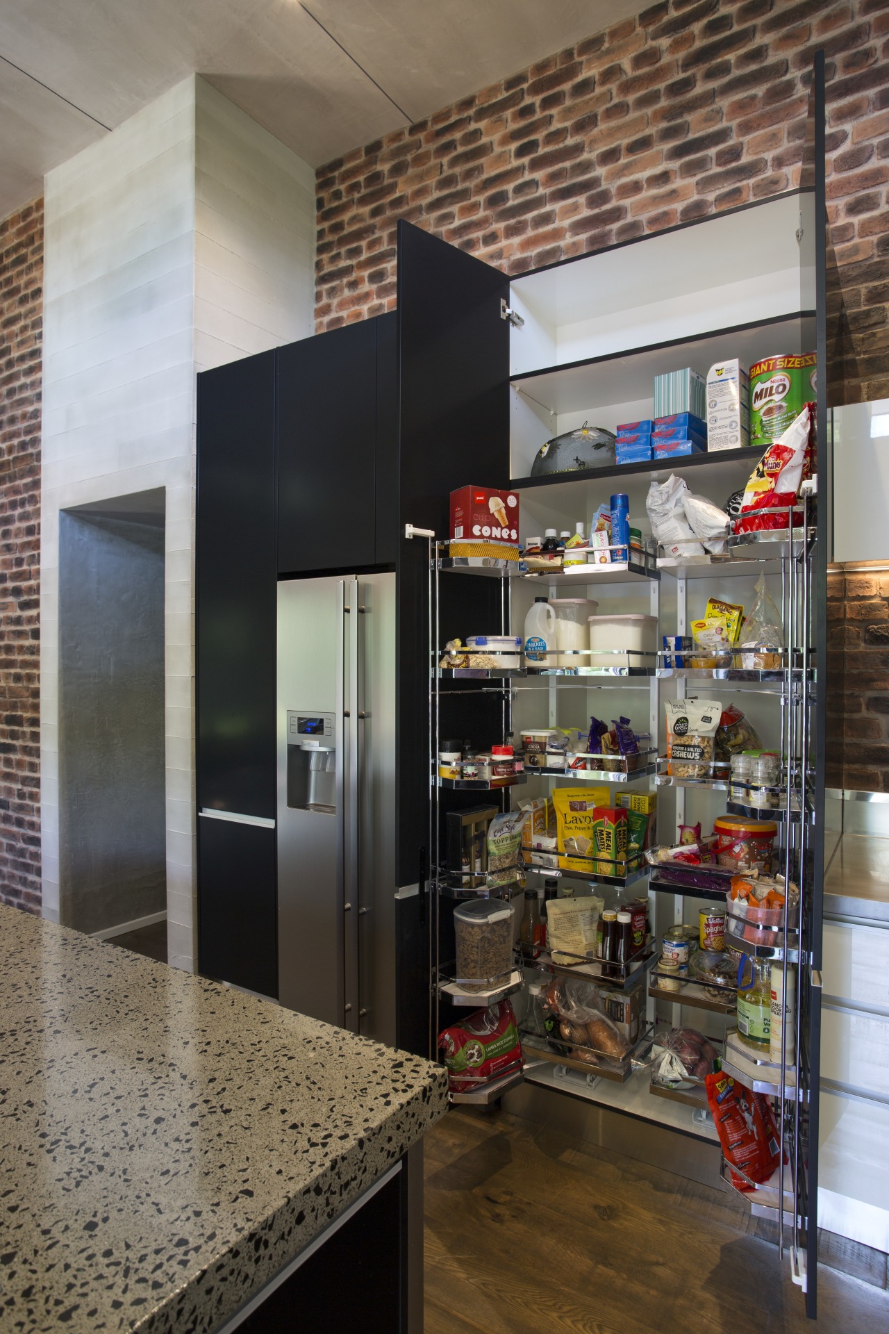 Whats behind the pantry door to the right interior design, shelving, black, gray