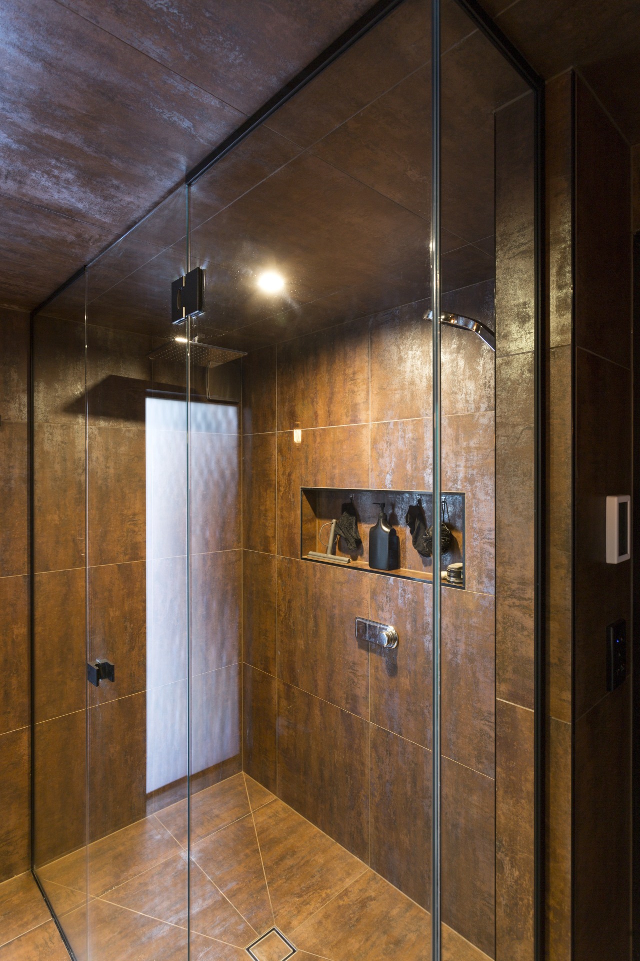 To bring light into this bathroom, designer Hayley bathroom, ceiling, floor, flooring, interior design, lighting, room, tile, wall, wood, wood flooring, brown