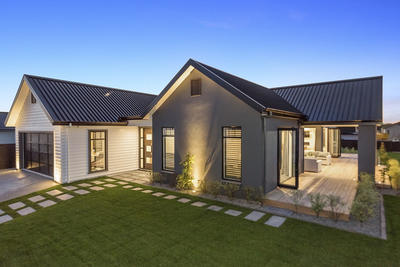 Clad in complementary, low-upkeep Scyon weatherboard and grey cottage, elevation, estate, facade, farmhouse, home, house, property, real estate, residential area, siding, brown, teal