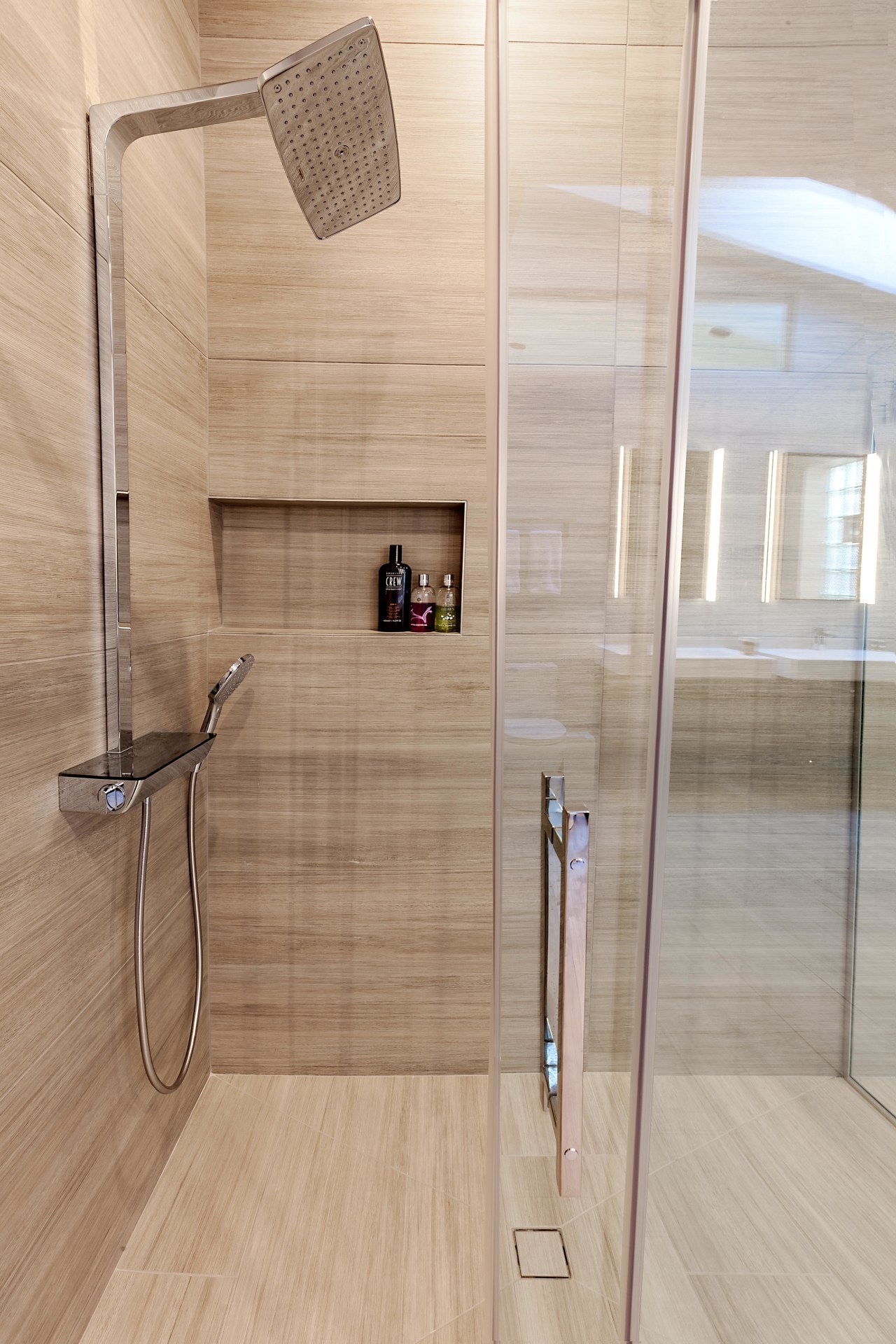 Building out one wall of this shower allowed bathroom, floor, flooring, plumbing fixture, product design, tap, tile, wall, wood, wood flooring, gray