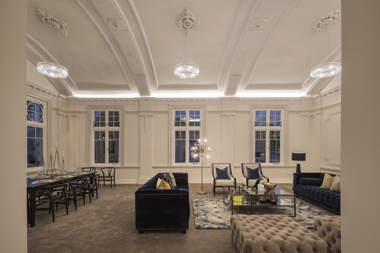 On this adaptive reuse project, two historic buildings ceiling, daylighting, estate, interior design, living room, lobby, real estate, room, orange, brown