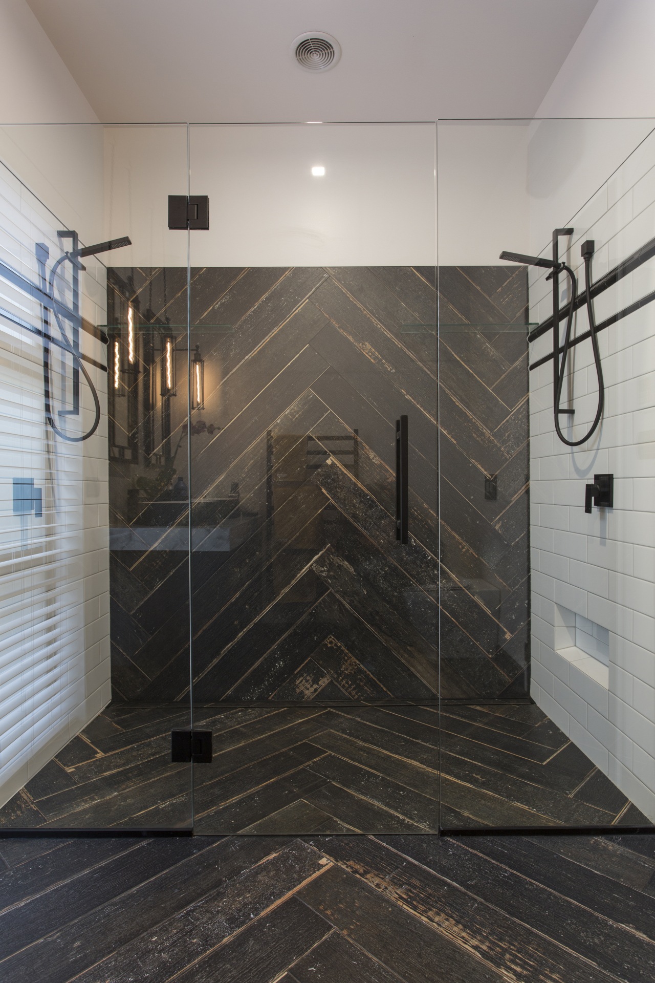 Contributing to this master suites dramatic black and bathroom, floor, flooring, glass, interior design, plumbing fixture, room, shower, tile, wall, gray, black