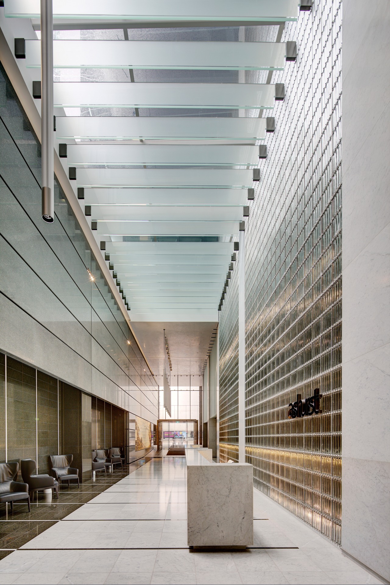 The triple-height foyer in the new 5 Martin architecture, building, ceiling, commercial building, condominium, corporate headquarters, daylighting, facade, glass, headquarters, lobby, structure, gray