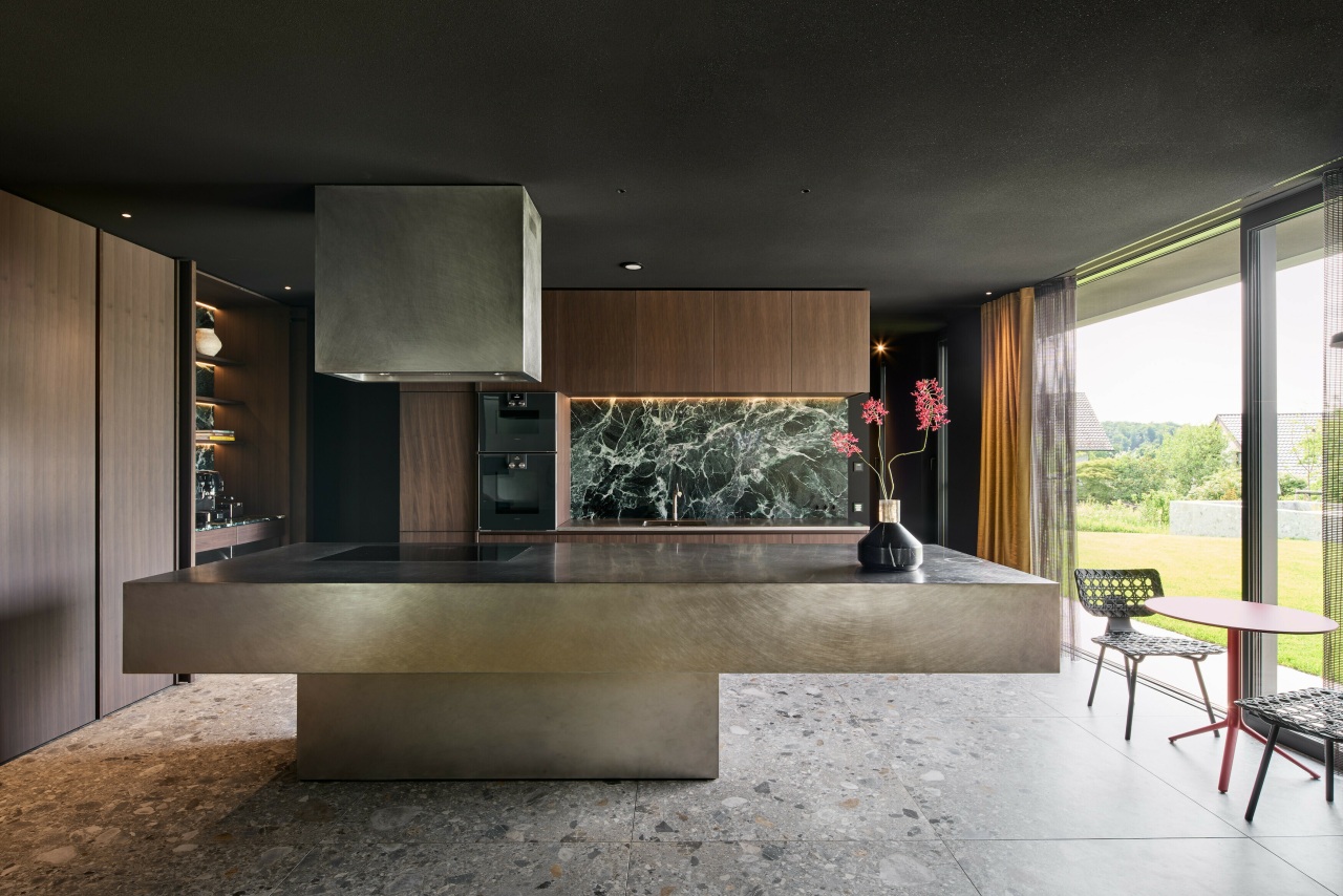 Kitchen with spectacular cantilevered island and feature quartz 