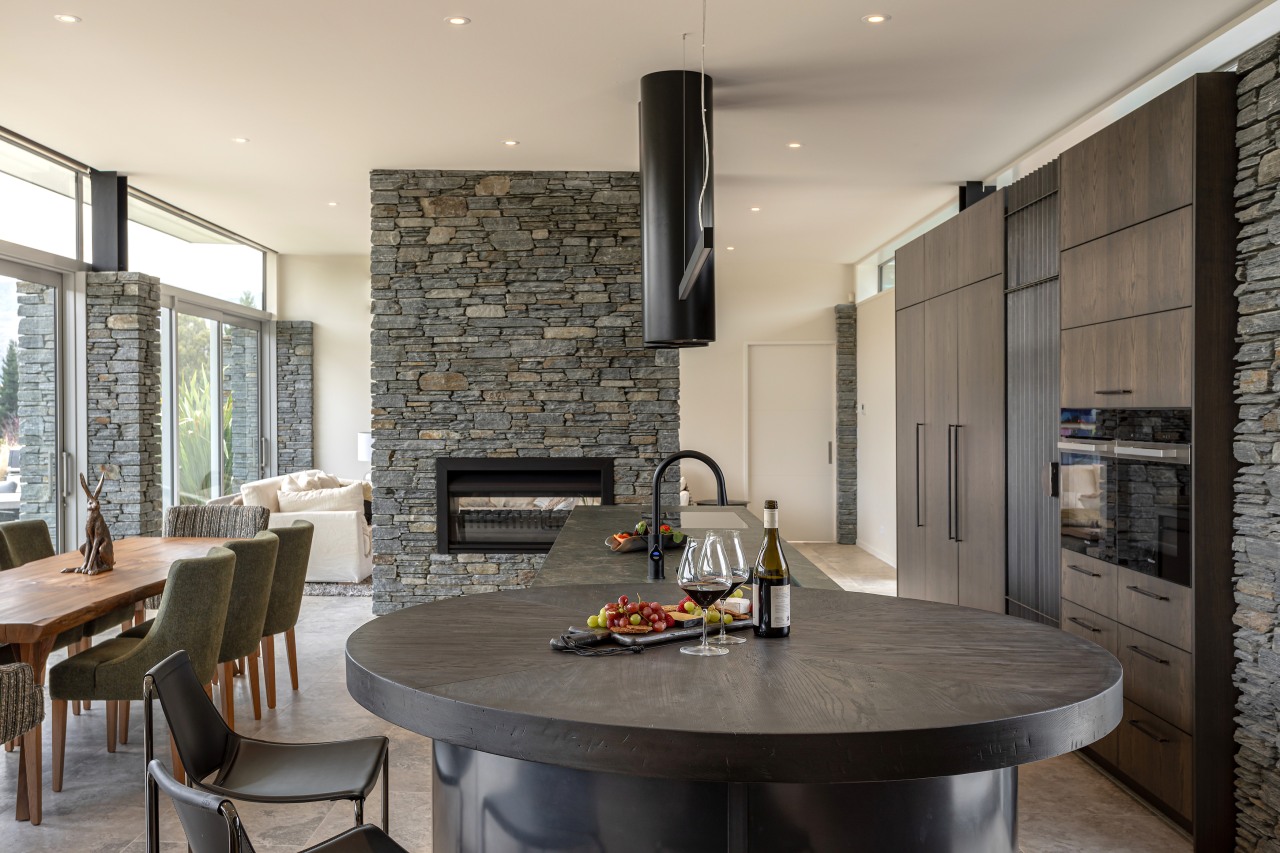 The wood-finished cabinetry works well with the surrounding 