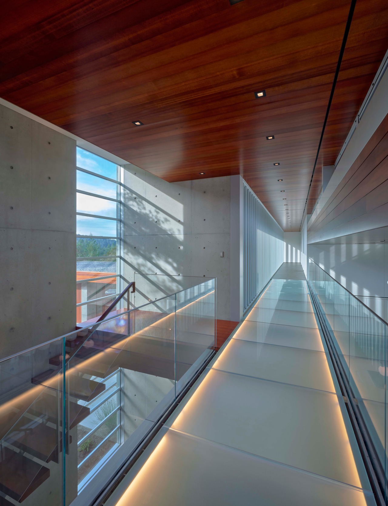 The glass bridge above the entrance is accessed 