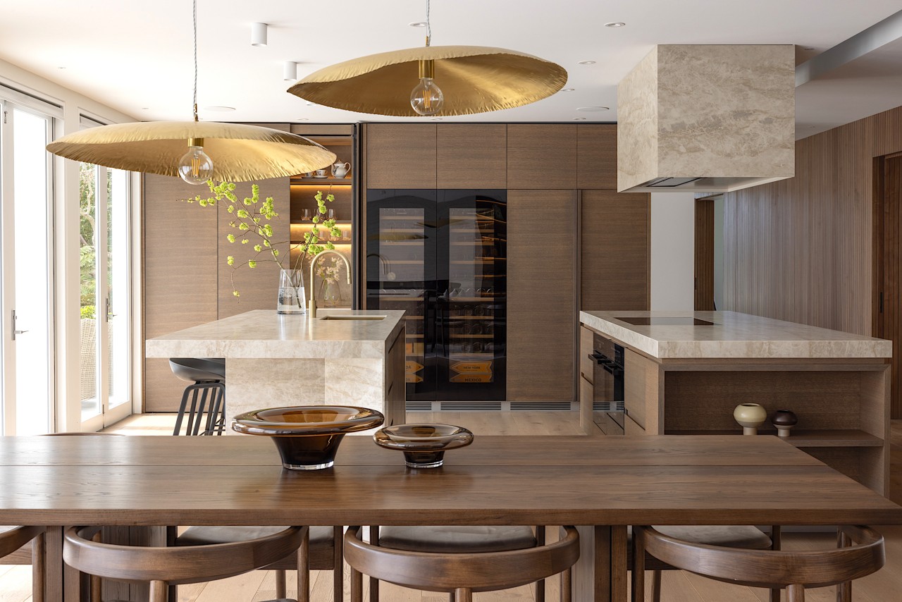 Warm wood tones predominate in the kitchen and 