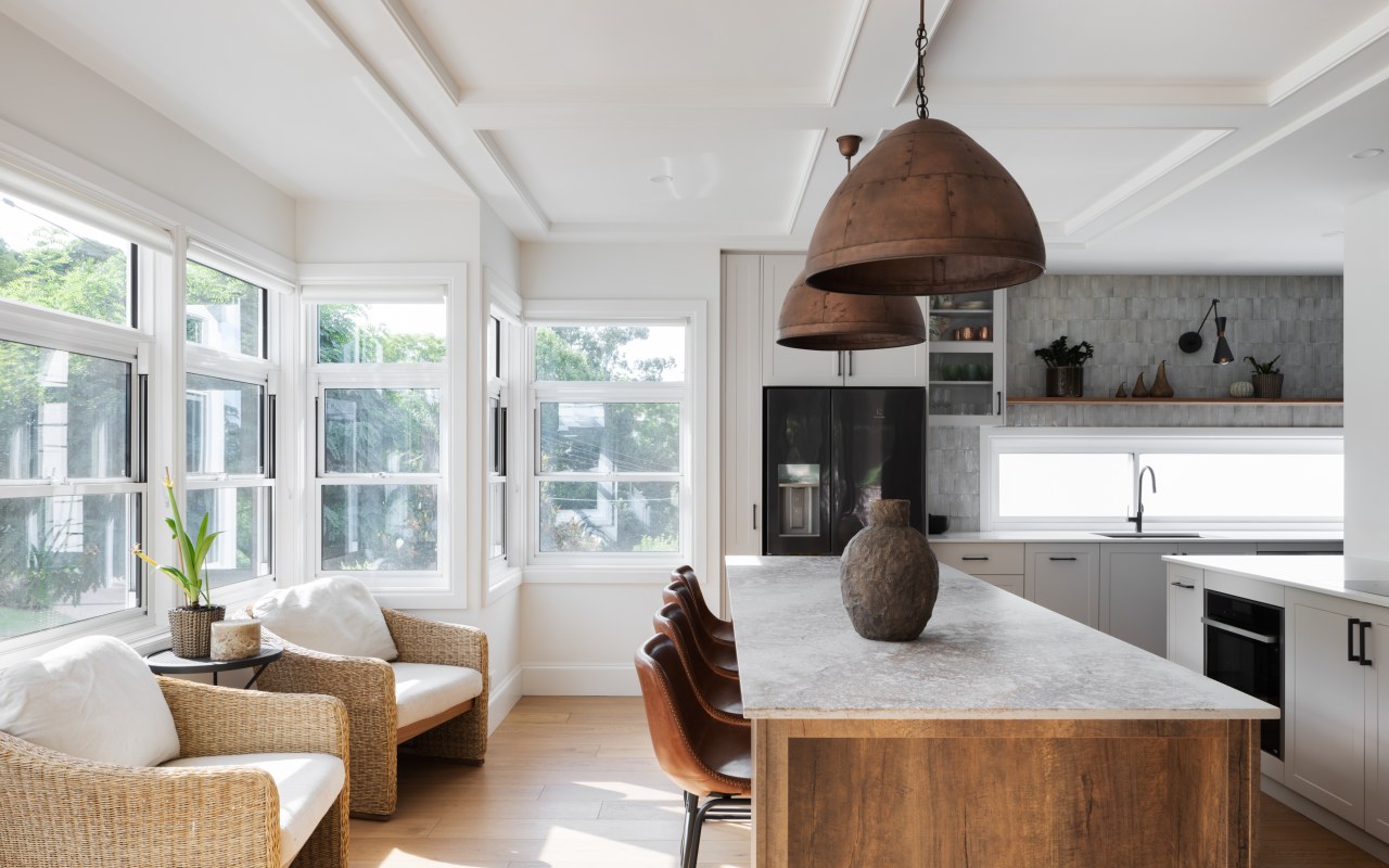 Kitchen island with eye-catching pendants above. 