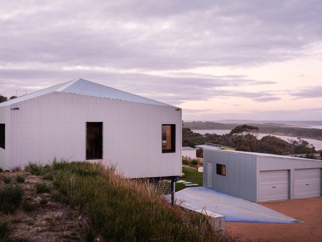The home, garage and out buildings are clad 