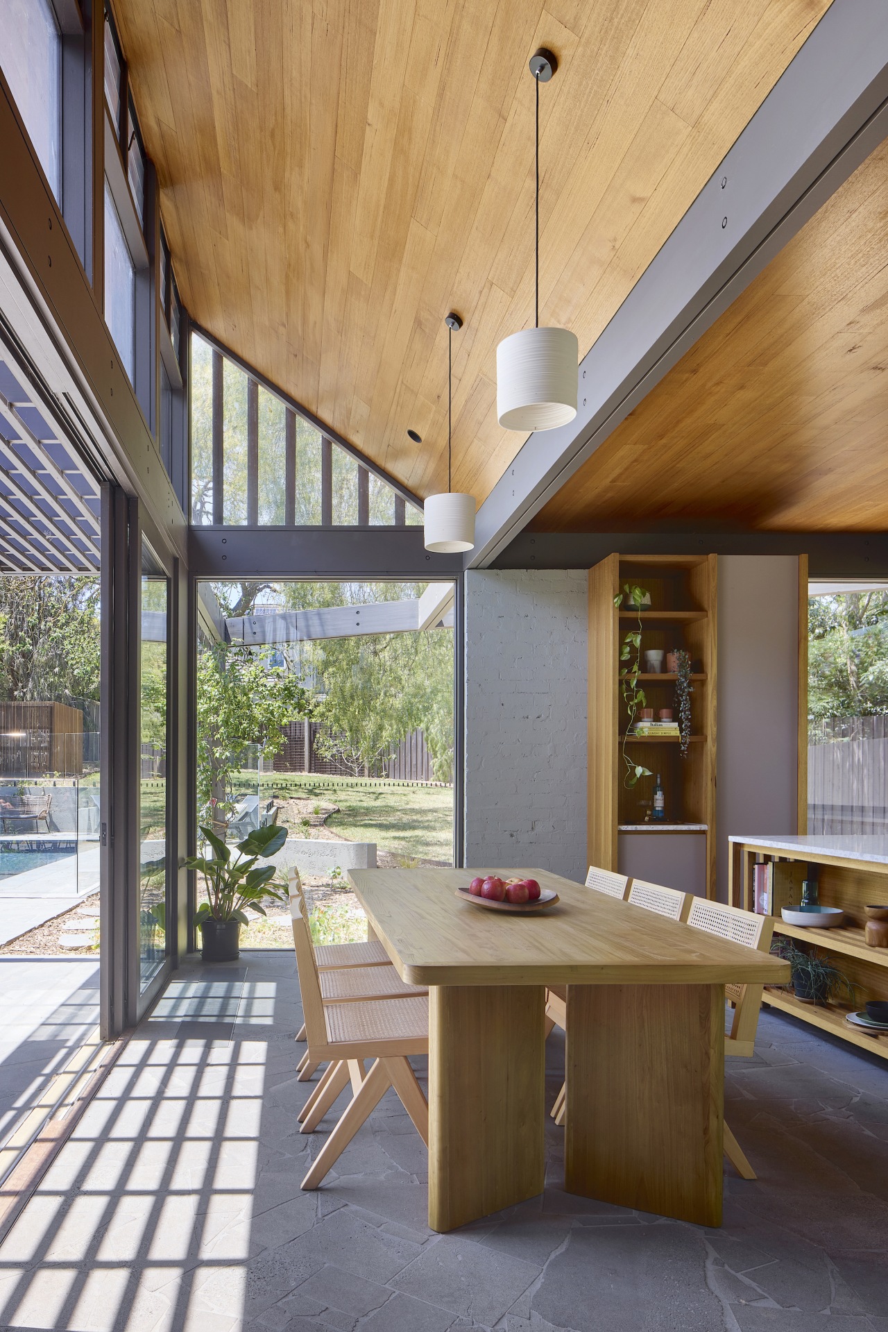 The texture and colour of the wood ceilings 