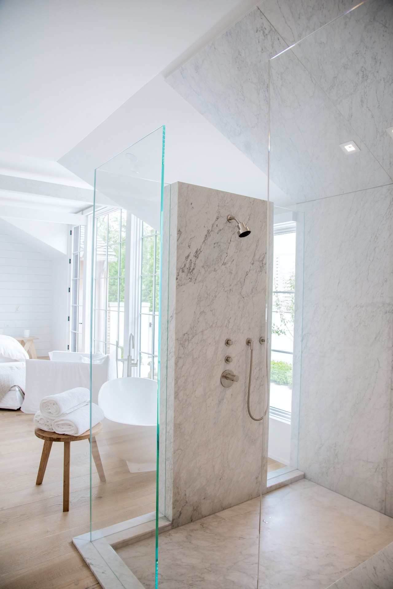 A wall of Carrara marble means someone using 