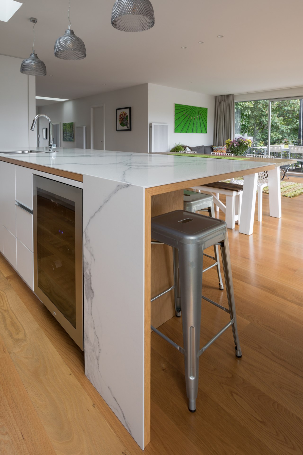 The kitchen island needing to be a zone cabinetry, countertop, cuisine classique, floor, flooring, hardwood, interior design, kitchen, laminate flooring, room, table, wood, wood flooring, gray, brown