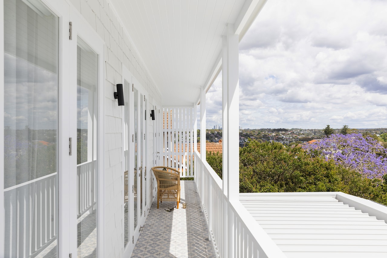 The new upstairs front balcony. - Heightened presence 