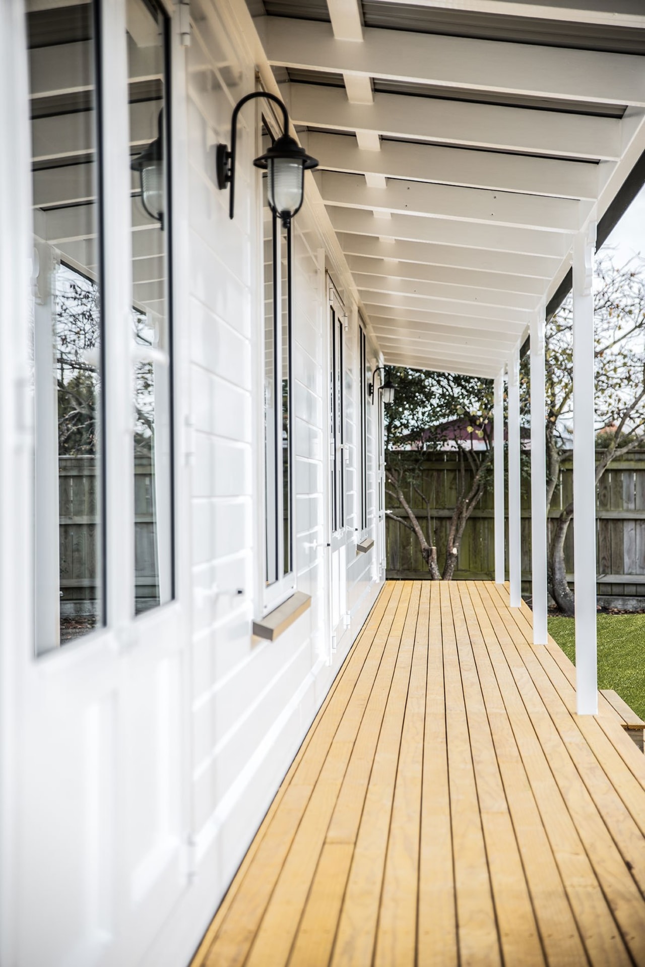 Finish A Porch With Niagara Laminated Timber Posts daylighting, deck, floor, flooring, house, outdoor structure, porch, siding, structure, window, wood, white, gray
