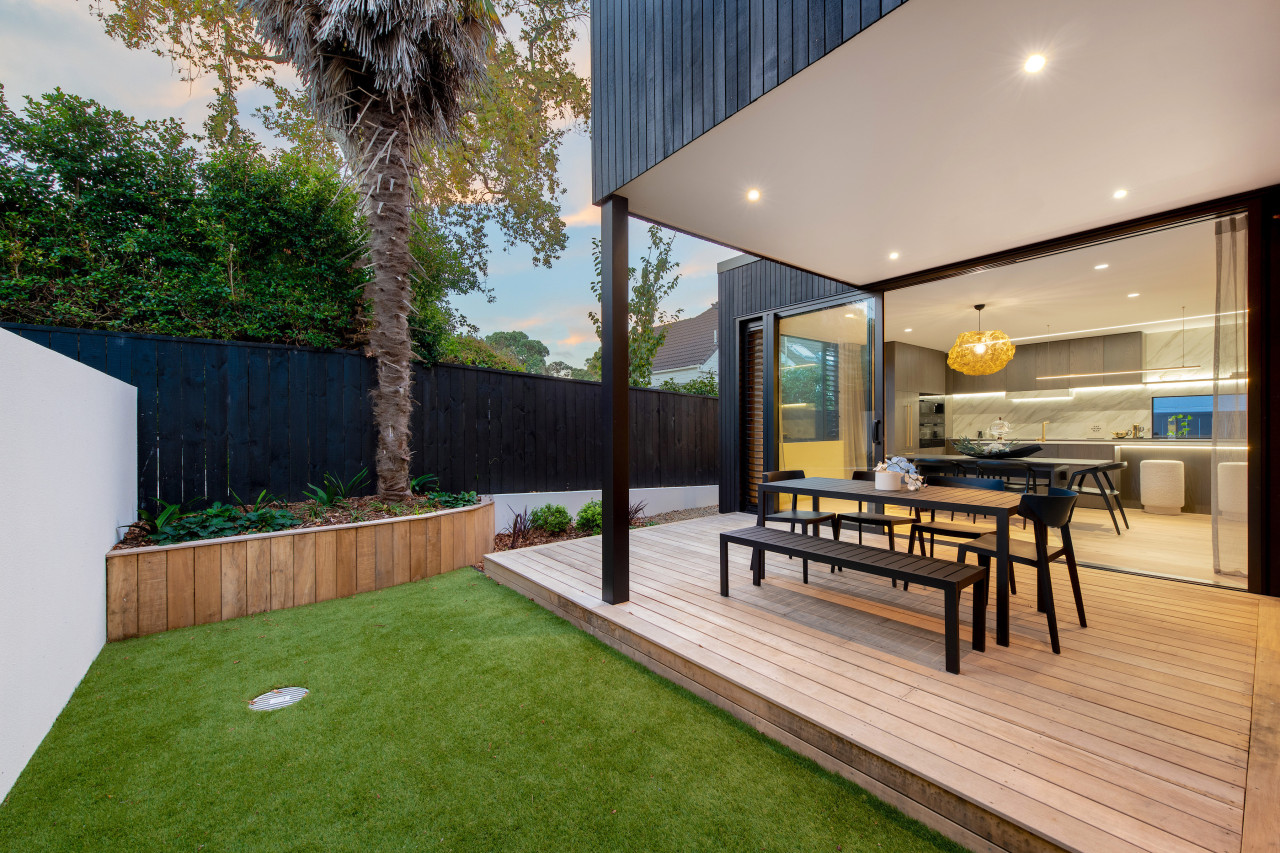 The rear of the home with generous backyard, 