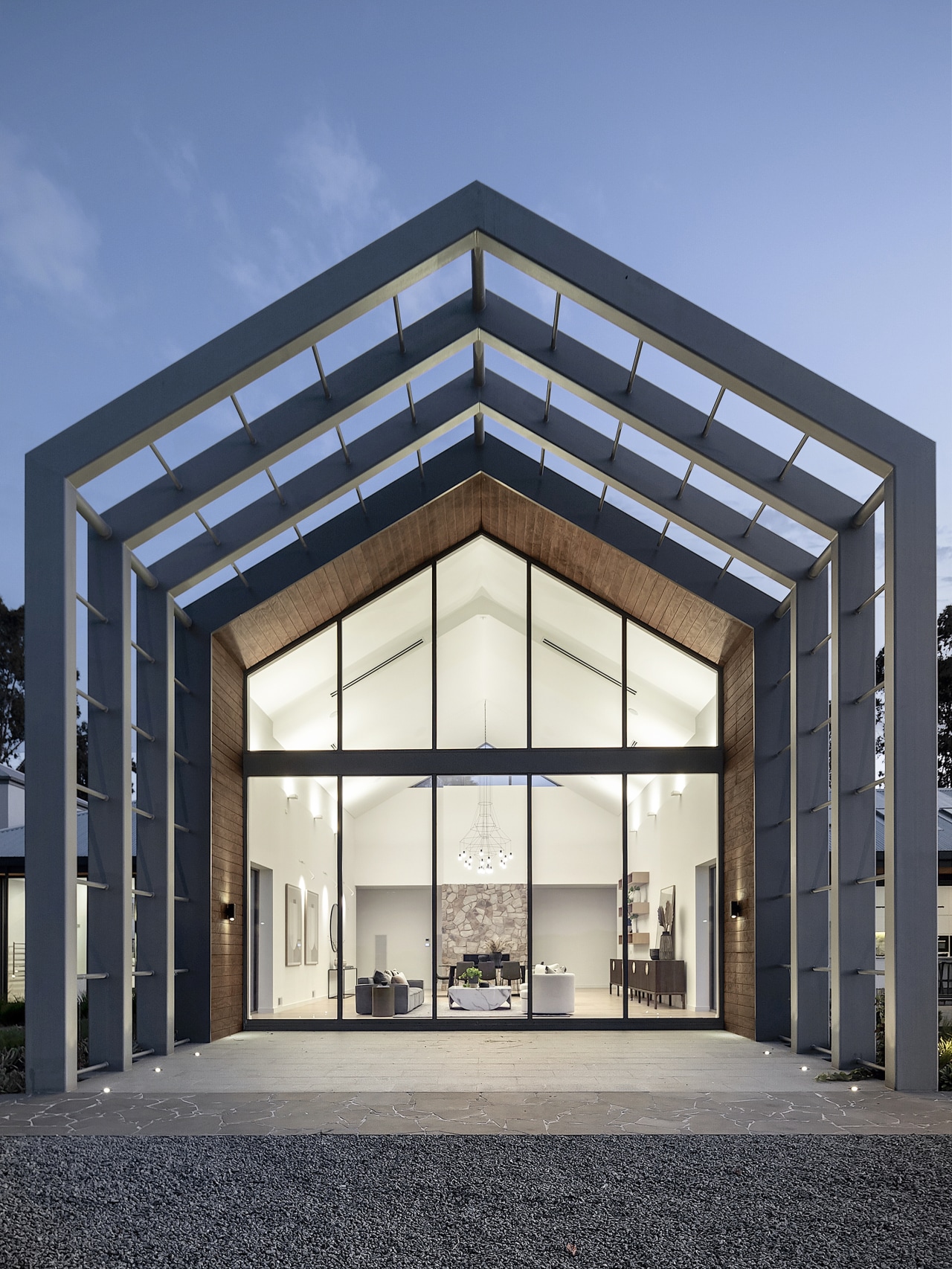 Exterior view of living, celebrating barn-like profile. 