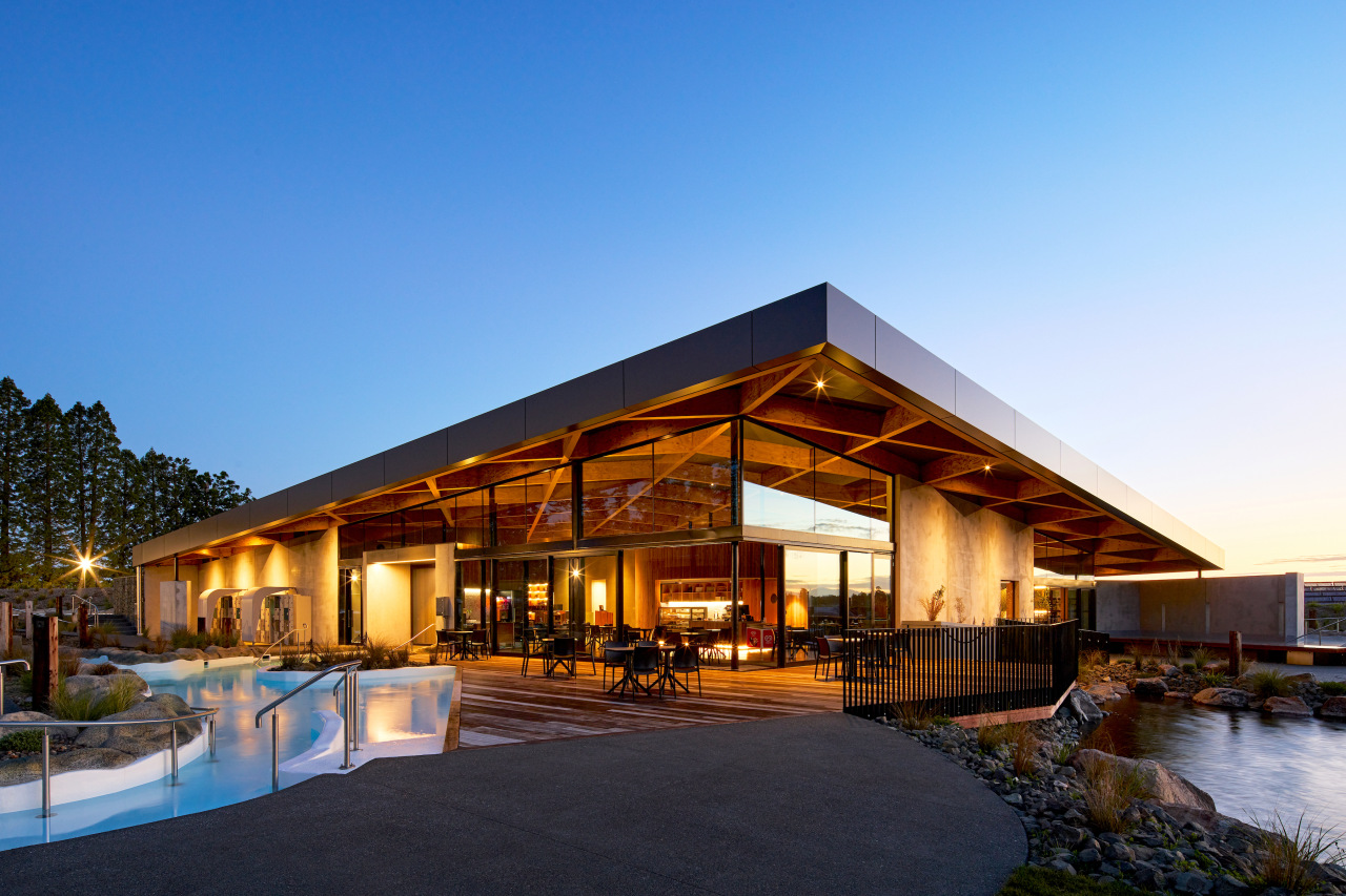 The roof structure floats above the beech clad 