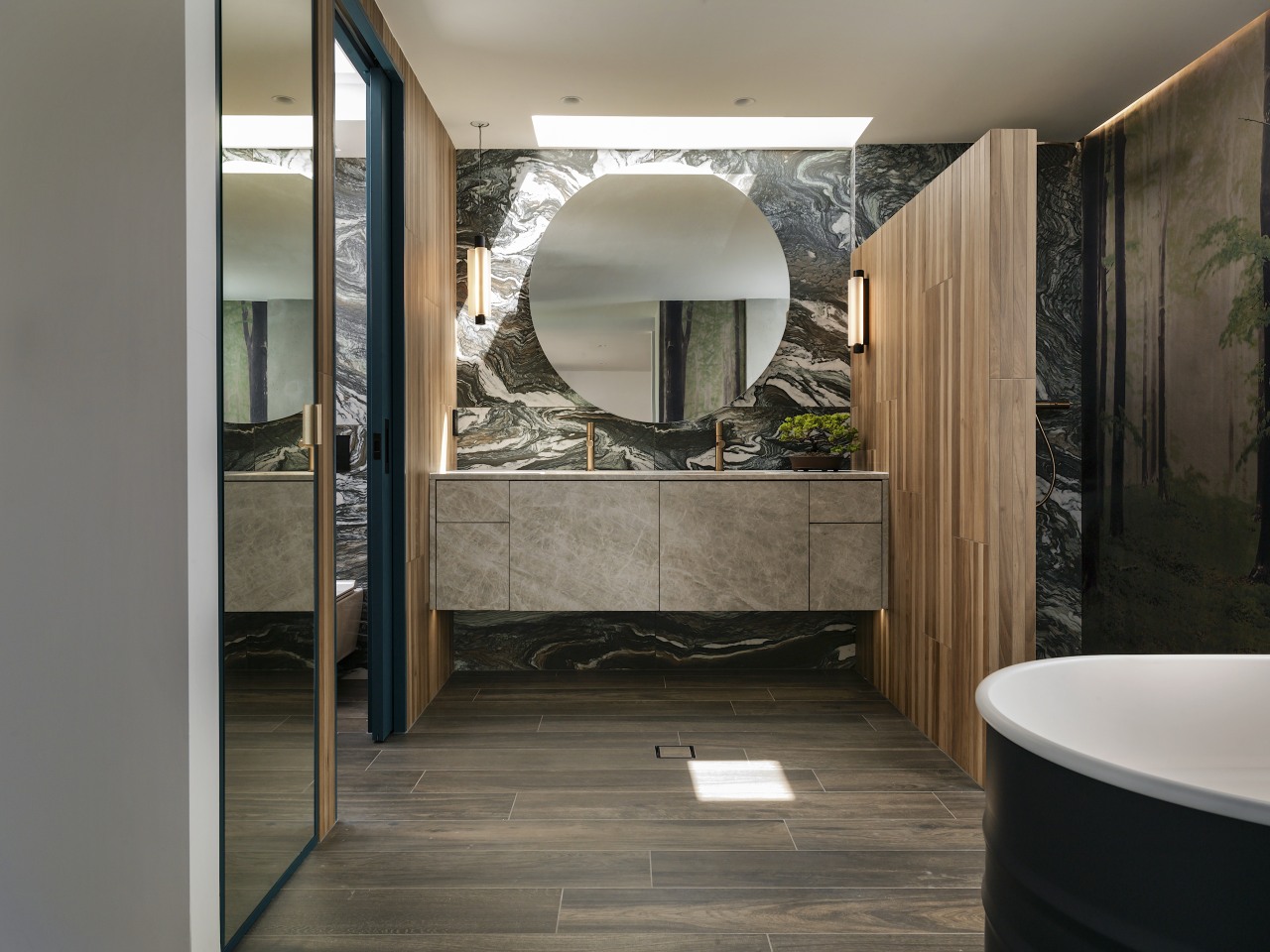 The design embraces biophilic touches, with select materials 