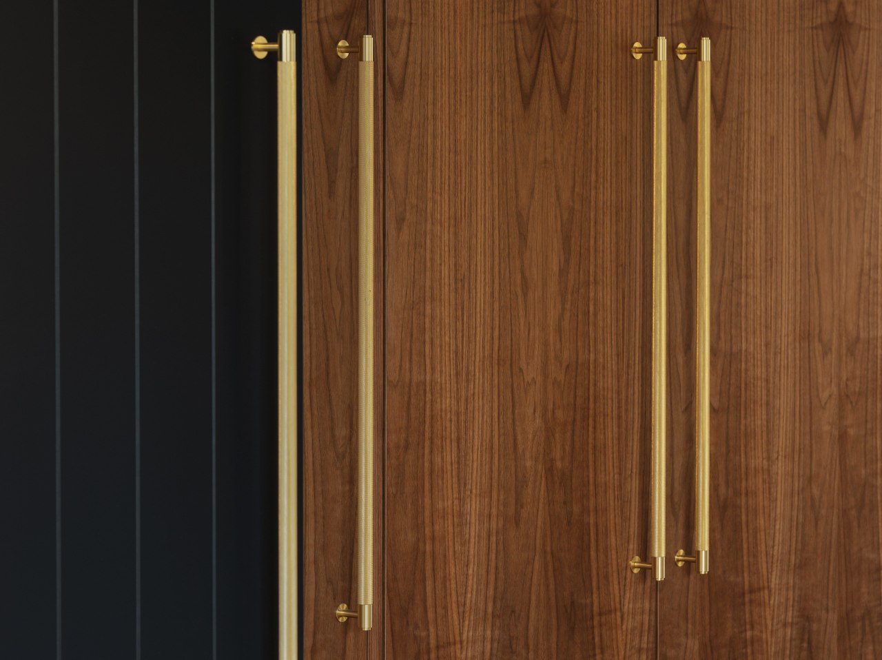 American walnut veneer meets a weatherboard-look barn door