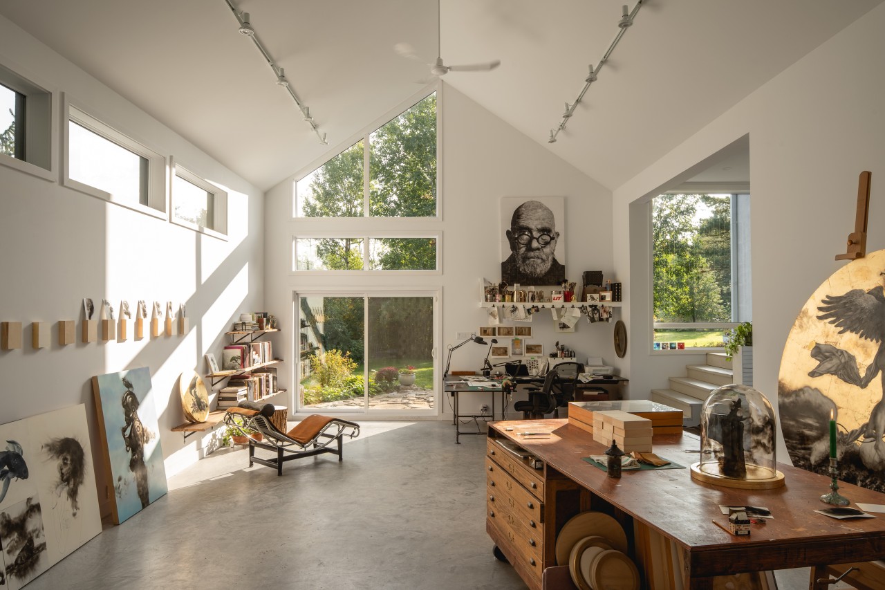 Light-filled and airy, the studio is all blackened 