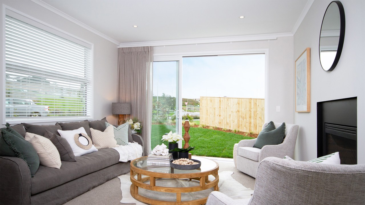 The formal living room includes an operable window 