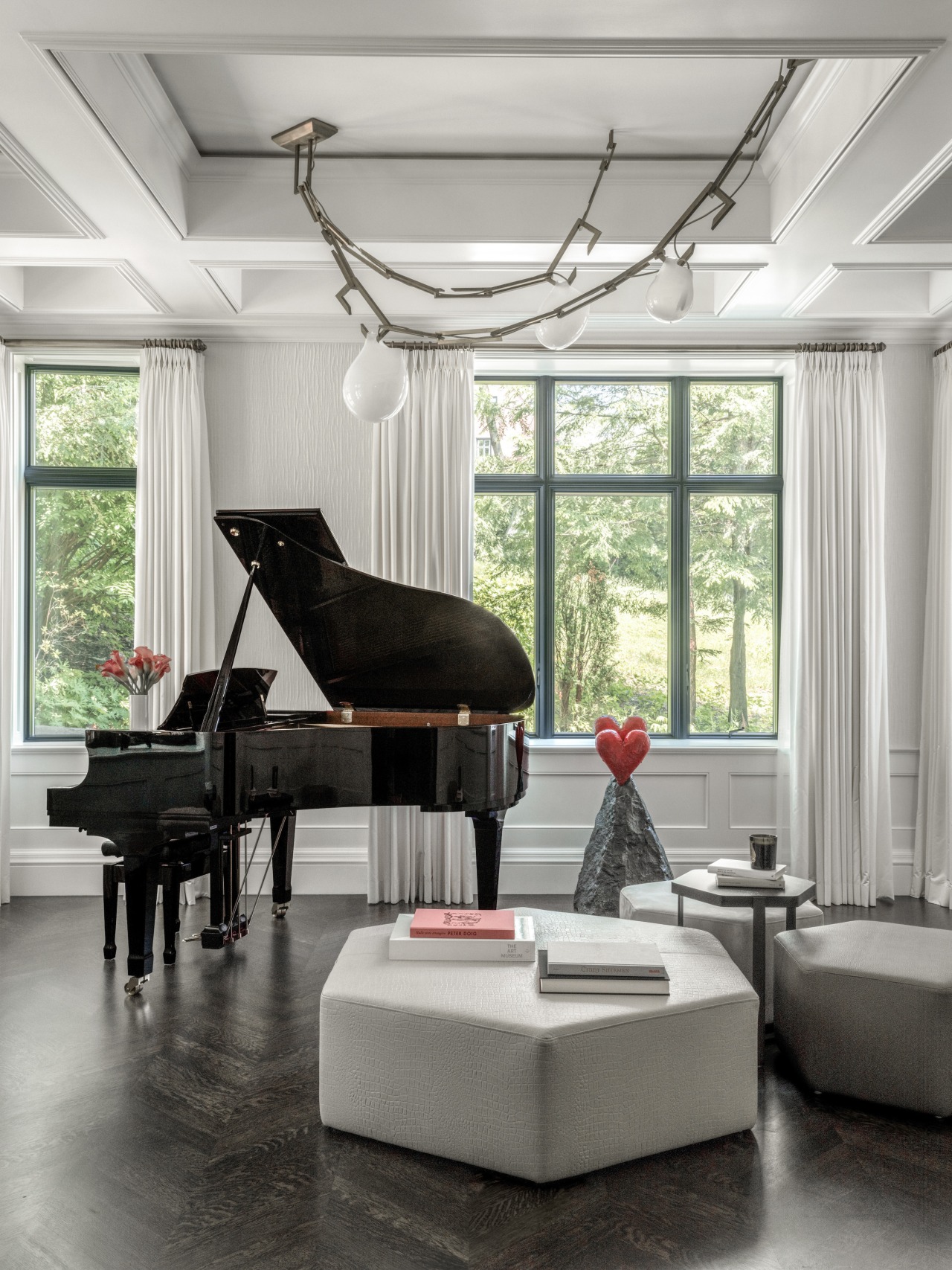 The main floor includes a music room, where 