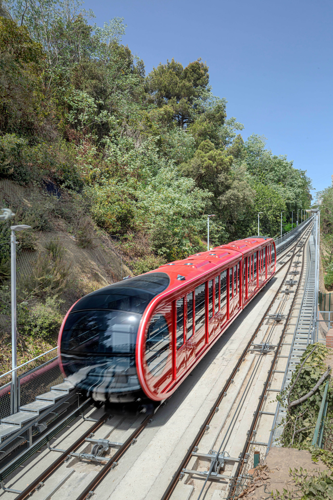 Unlike typical curved glass, the funicular employs two 