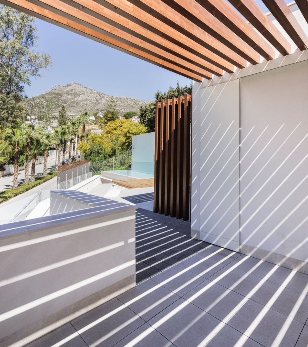 Looking out to the pool architecture, daylighting, facade, house, outdoor structure, property, real estate, roof, window, gray