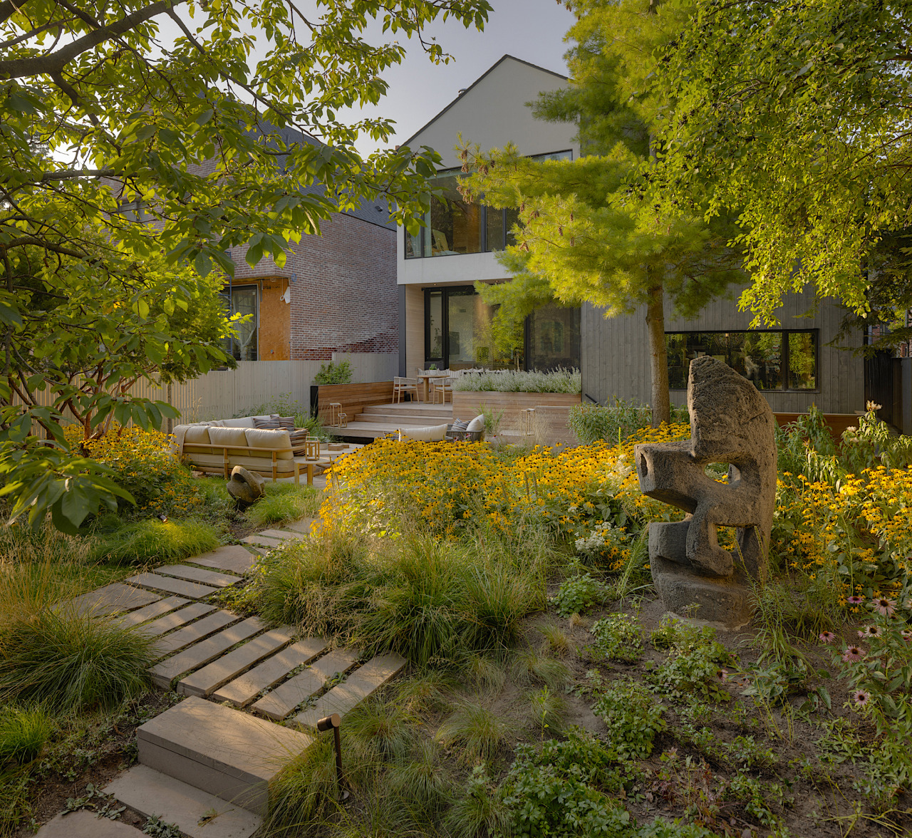 Multi-level patio with reused stone and decks cascade 