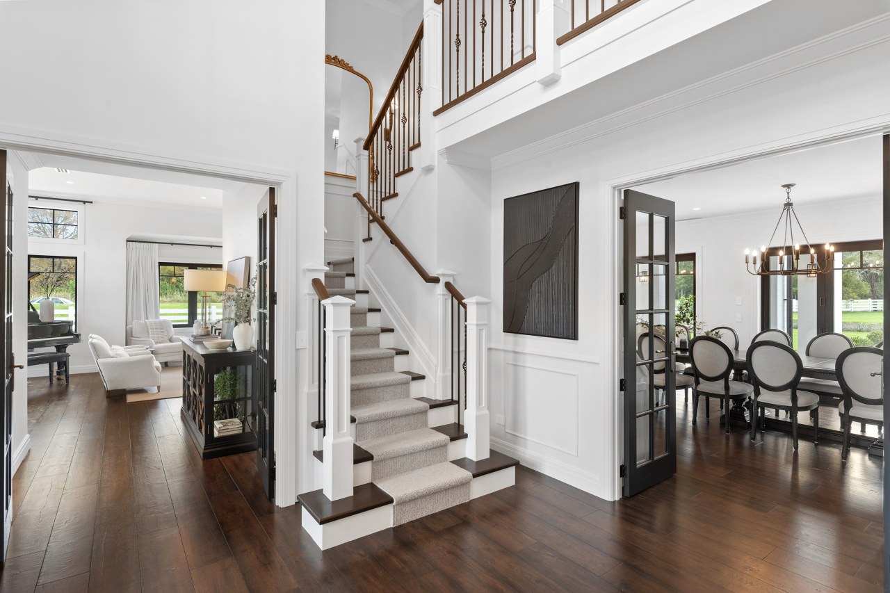 The central staircase reflects opulence and craftsmanship. 