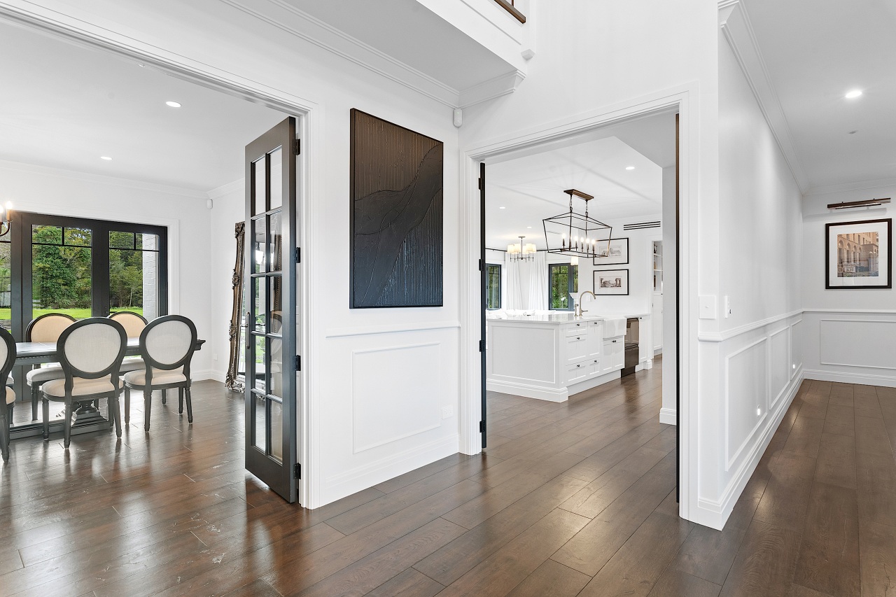 Airy and open downstairs circulation. - Large on 