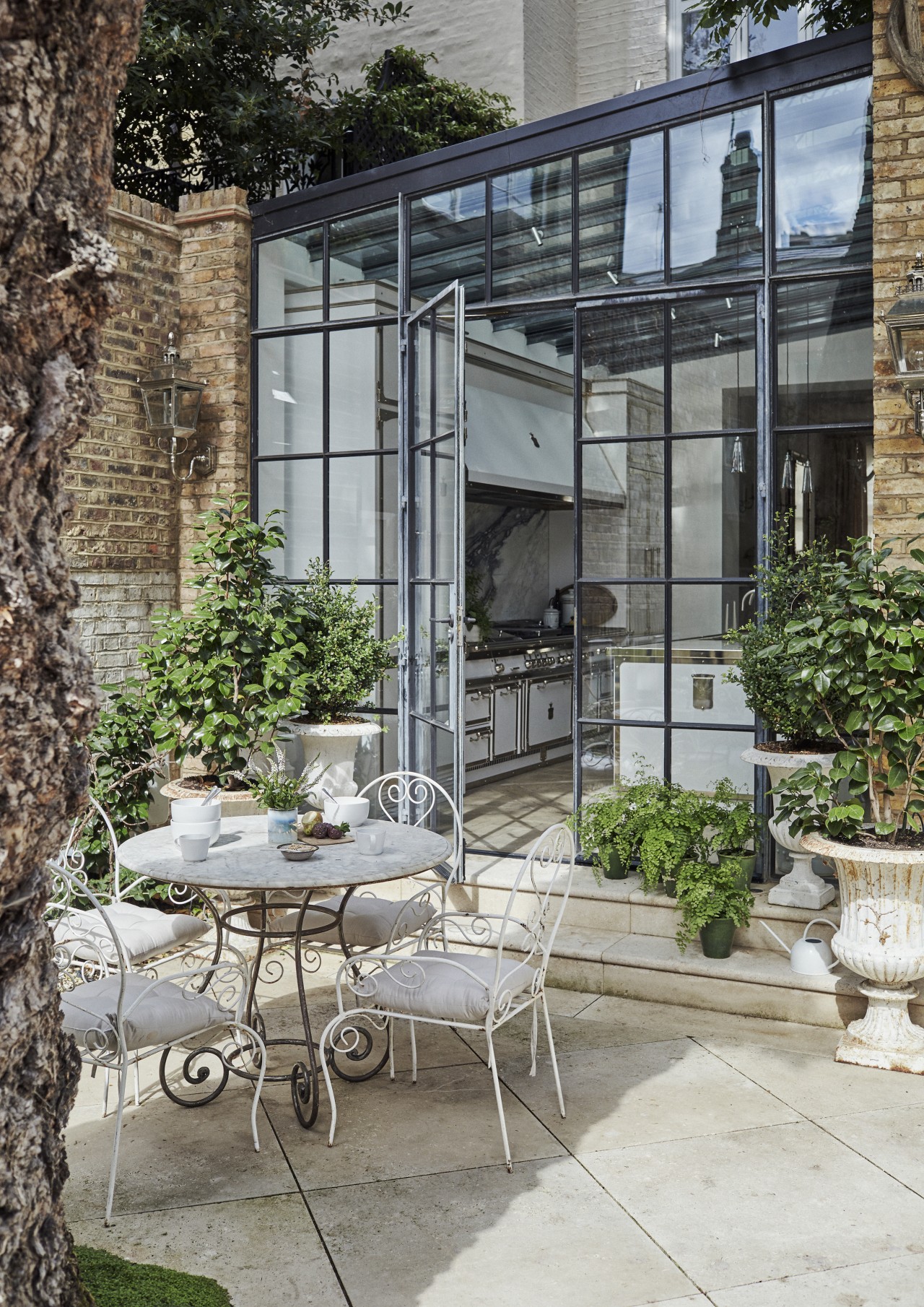A grand private courtyard garden connects the Main 