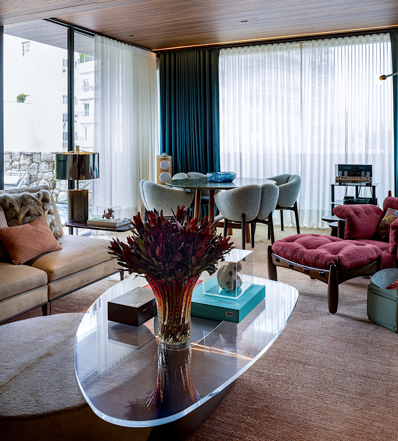 Upstairs lounge with transparent coffee table. 