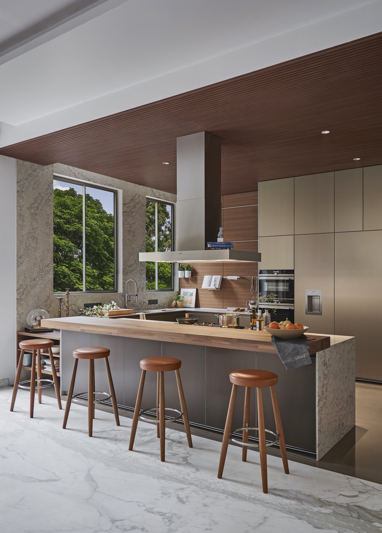 The breakfast bar is in walnut, as is 