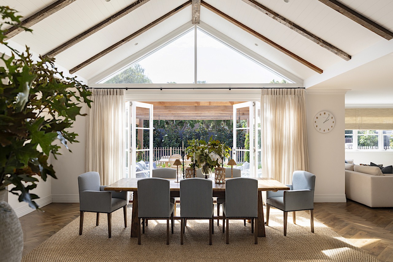 New dining area with airy centrally raked ceiling. 