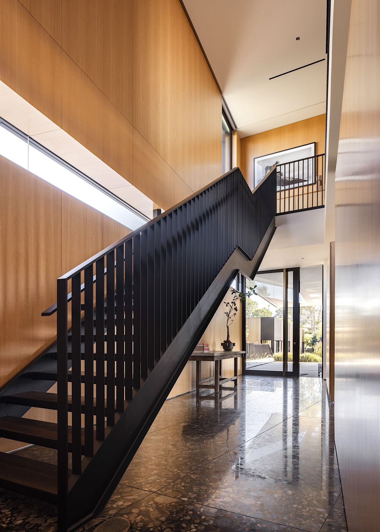 Staircase in the main home with the studio 