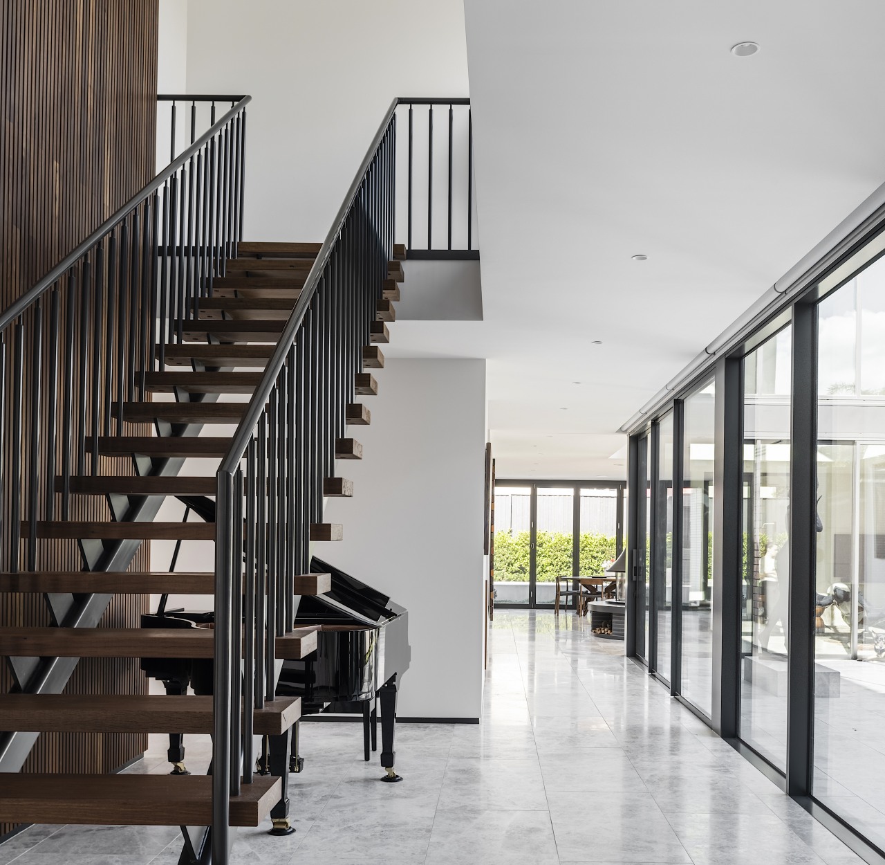 Stairs, formal living room straight ahead and side 