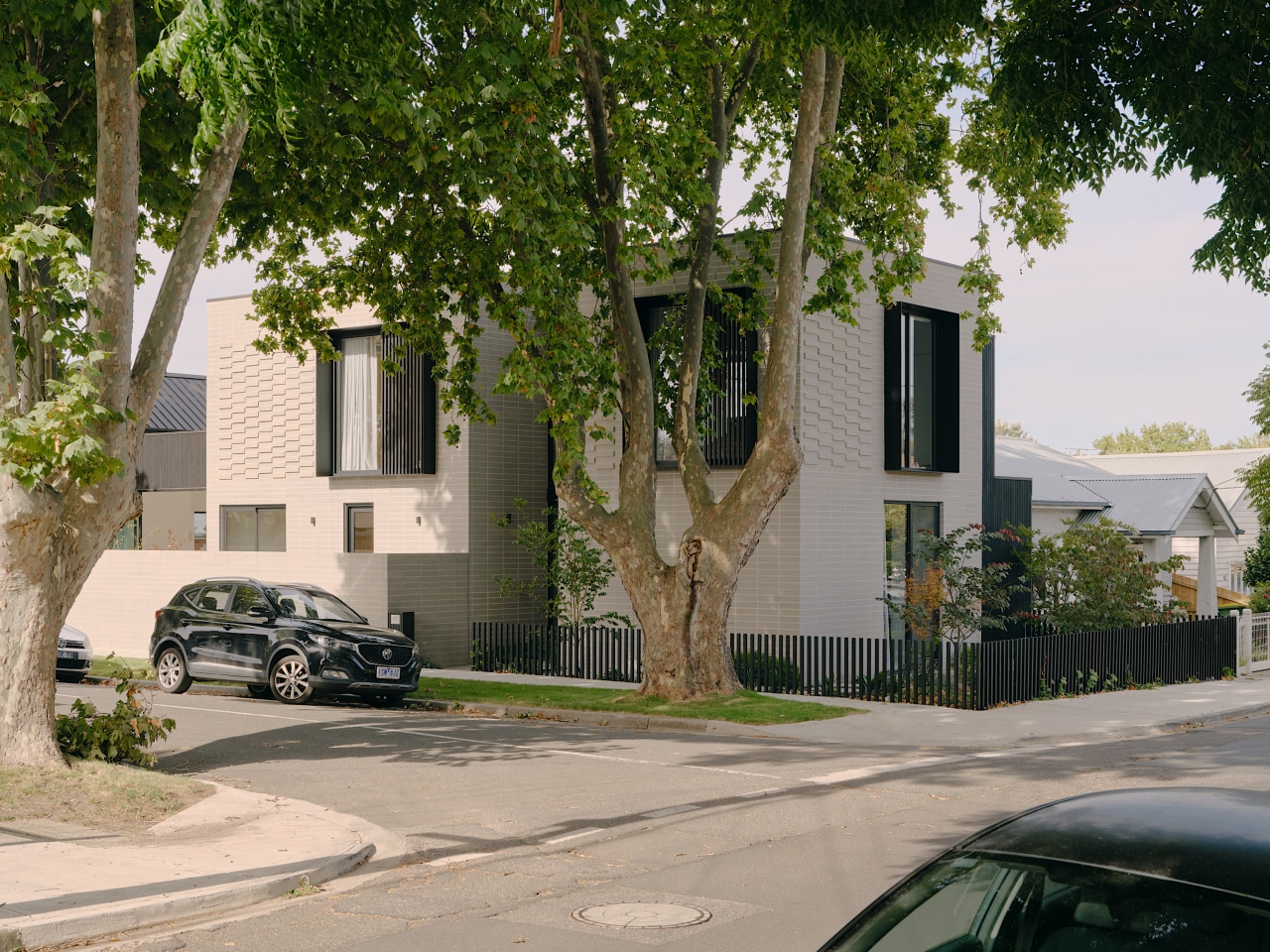 Nestled on a snug corner block, this family 